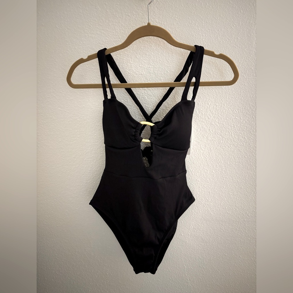 Becca black one piece bathing suit, high leg